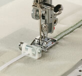 Janome 7mm - Lovertjes-/Bandvoet Janome 7mm - Lovertjes-/Bandvoet